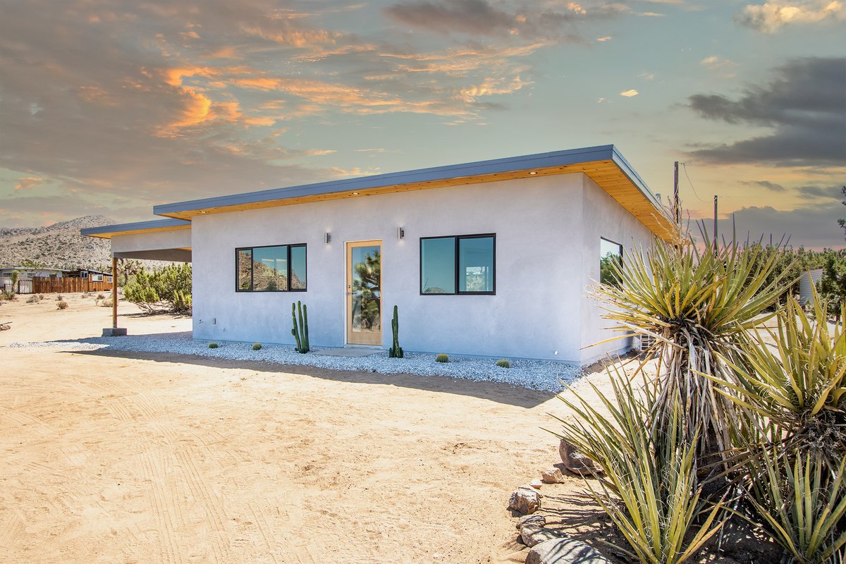 Desert Gold Drive Bungalow — restored modern desert home at sunset