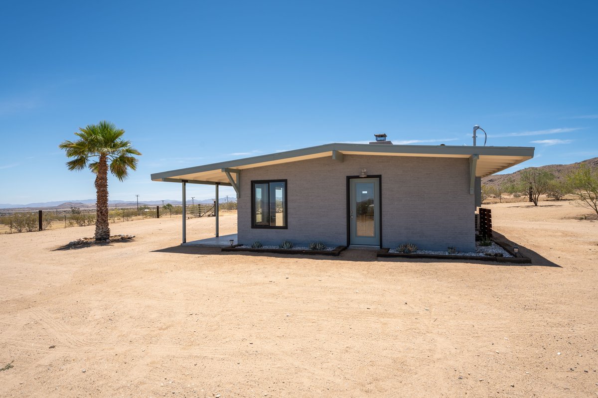 Kickapoo Trail Cabin — restored mid-century desert home with covered carport
